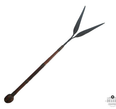 An exceptional and rare Shona ceremonial bident (two-pronged) staff, showcasing the pinnacle of 19th-century Zimbabwean metalwork and wire artistry.